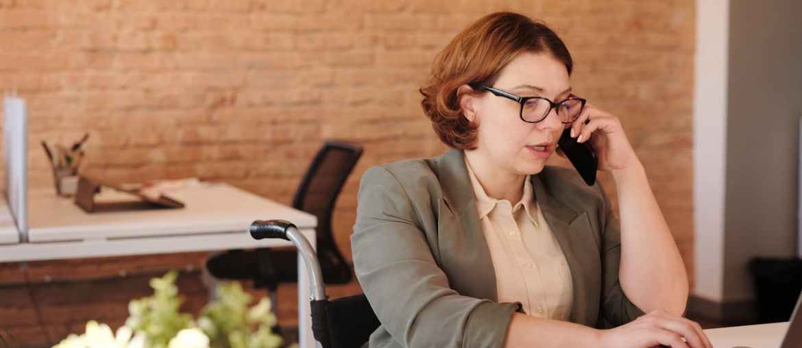 image of a woman talking on the phone looking for automation alternatives anywhere